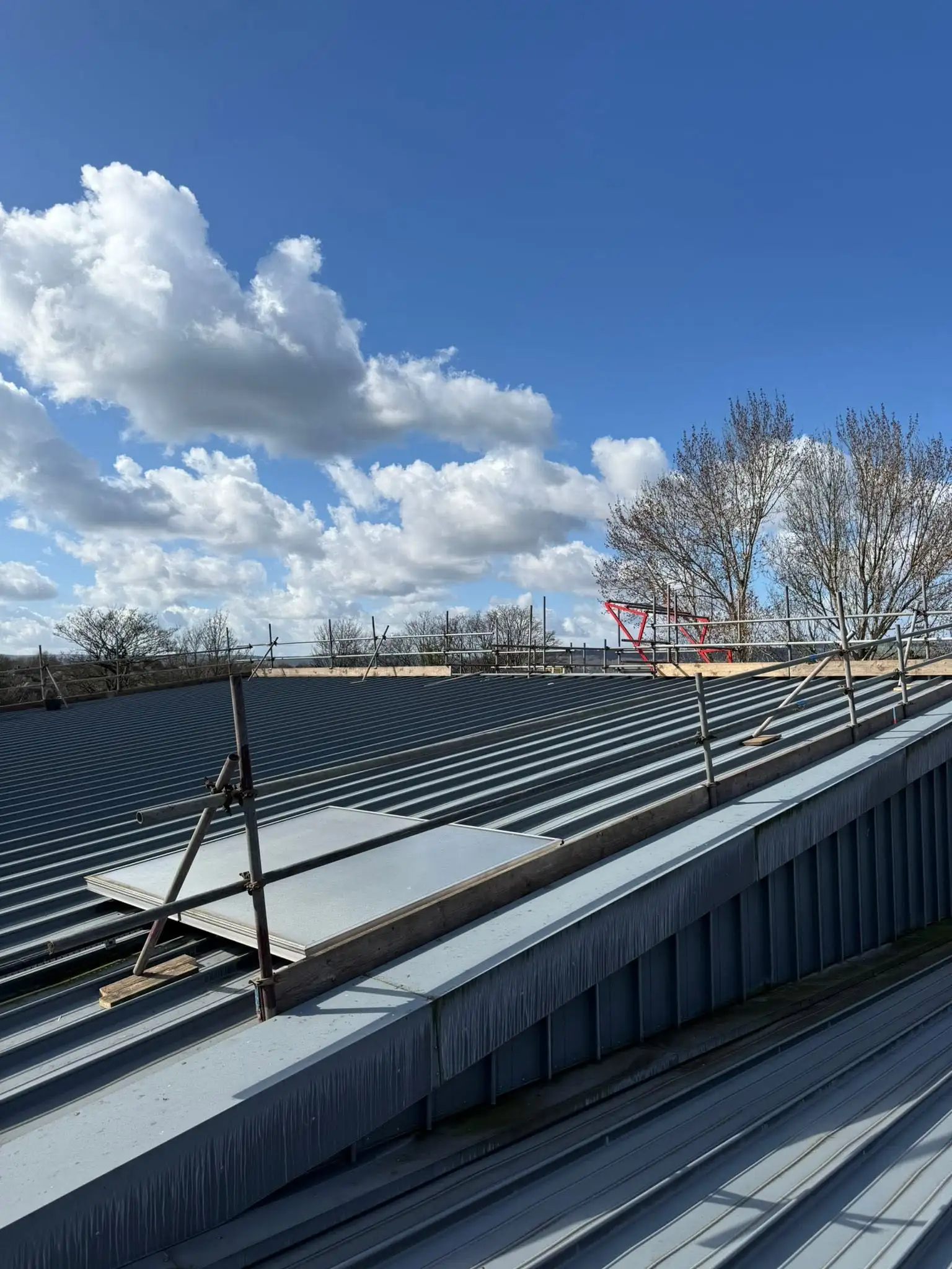 Commercial edge protection for solar installation with solar panels fitted.